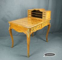A REALWOOD AND PARQUETRY BUREAU PLAT AND CARTONNIER BY ANTON WERNER SVERIGE 1896
